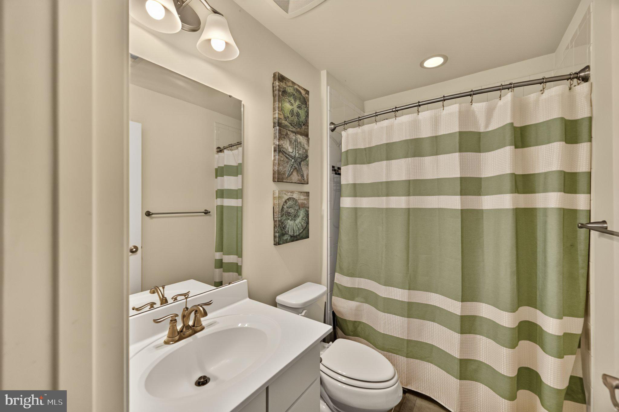 6357 Walcott Lane Frederick, MD 21703 - Photo 21 of 35 Charming bathroom with modern accents.