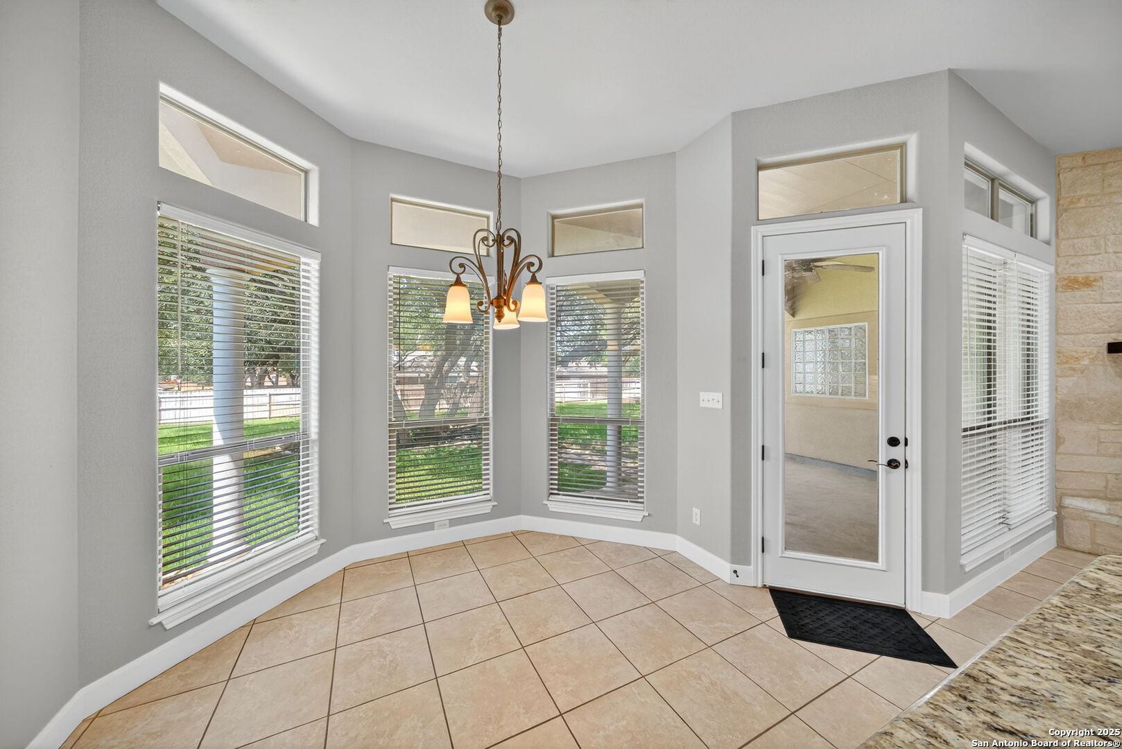1626 Clover Ridge Pleasanton, TX 78064 - Photo 11 of 33 a view of an entryway with a chandelier