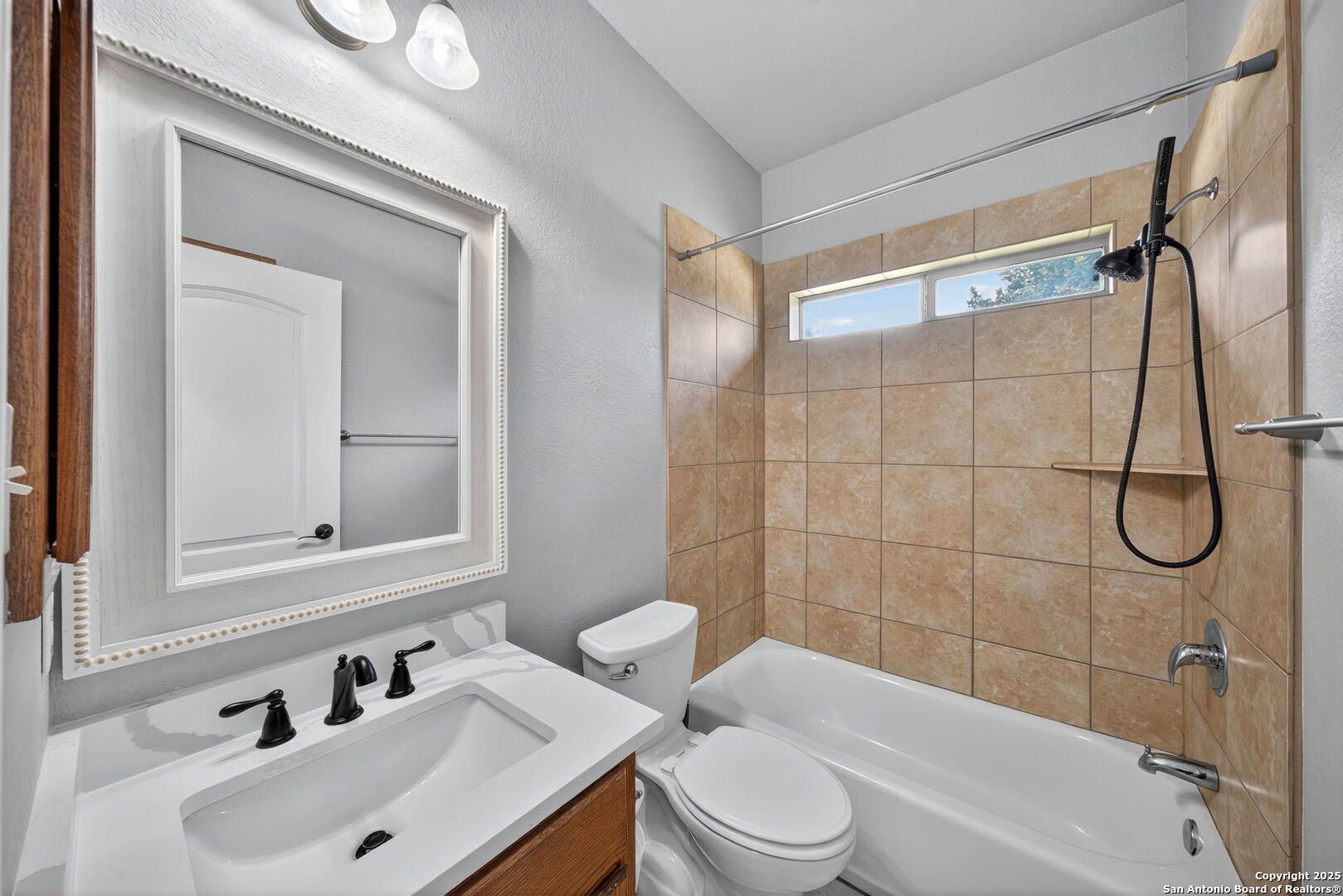 1626 Clover Ridge Pleasanton, TX 78064 - Photo 19 of 33 a bathroom with a sink a toilet and shower