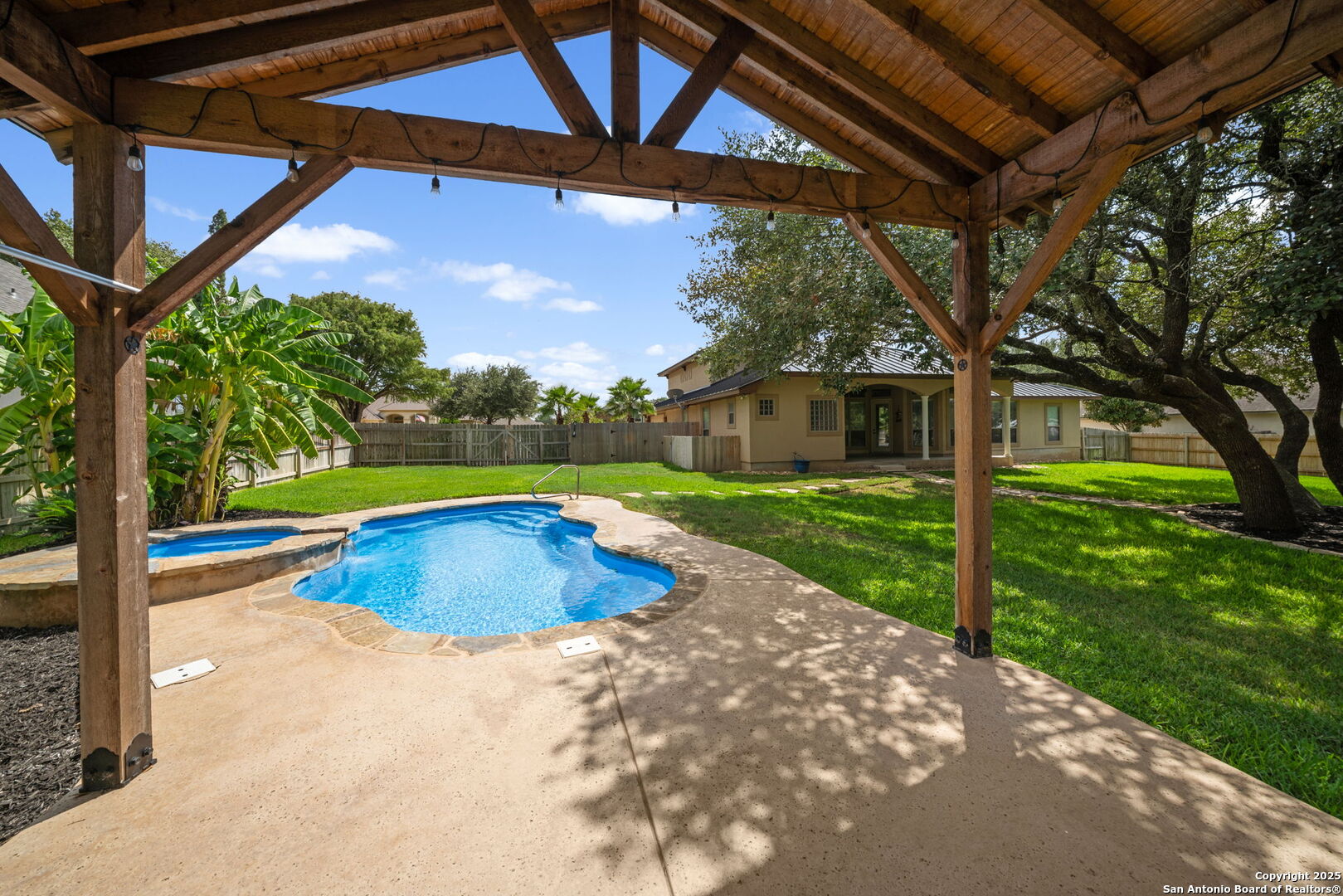 1626 Clover Ridge Pleasanton, TX 78064 - Photo 28 of 33 a view of a backyard with swimming pool