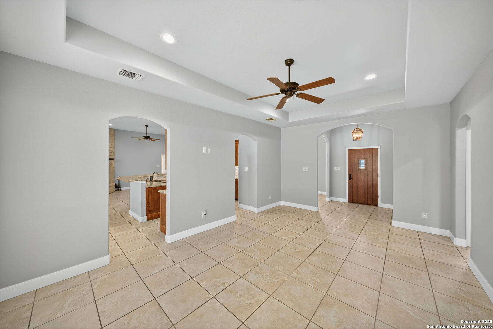 1626 Clover Ridge Pleasanton, TX 78064 - Photo 5 of 33 a view of a livingroom with a ceiling fan & a window