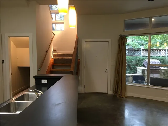 a view of a livingroom with wooden floor