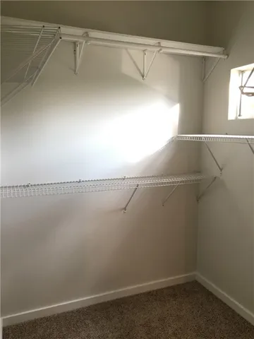 a view of a room with racks on the wall