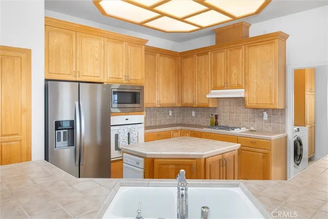 a bedroom with a bed and a television