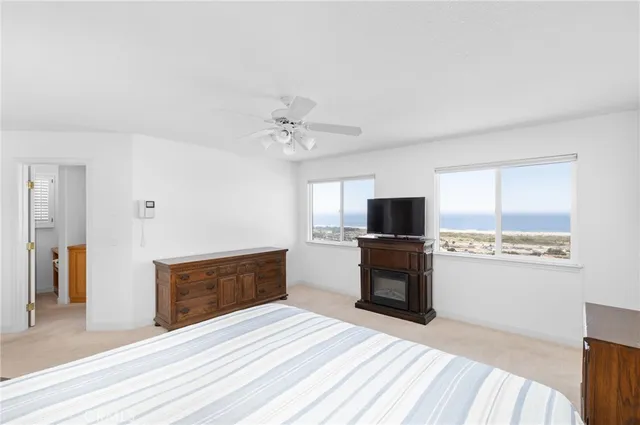 a bathroom with a bathtub and a window