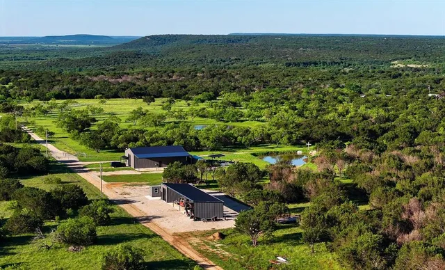 a view of a city with mountains in the background