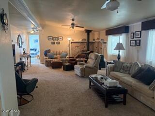 17230 Iron Springs Road Munds Park, AZ 86017 - Photo 12 of 42 a living room with furniture and a gym machine