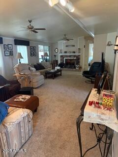 17230 Iron Springs Road Munds Park, AZ 86017 - Photo 13 of 42 a living room with furniture and a flat screen tv