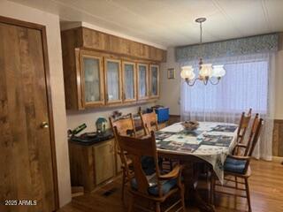17230 Iron Springs Road Munds Park, AZ 86017 - Photo 18 of 42 a view of a dining room with furniture