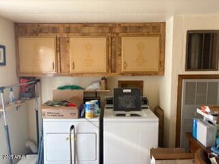 17230 Iron Springs Road Munds Park, AZ 86017 - Photo 21 of 42 a view of storage and utility room with washer and dryer