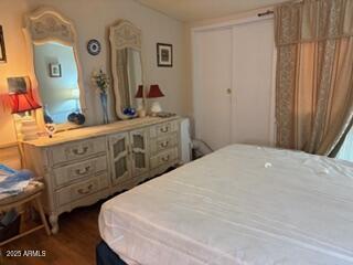 17230 Iron Springs Road Munds Park, AZ 86017 - Photo 30 of 42 a spacious bedroom with a bed and a dresser