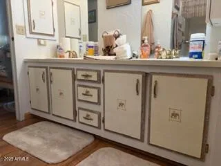 a view of cabinets and a window in the kitchen