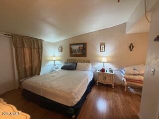 17230 Iron Springs Road Munds Park, AZ 86017 - Photo 37 of 42 a bedroom with bed and window