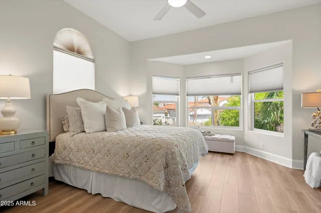 a view of a patio with a table chairs and a potted plant