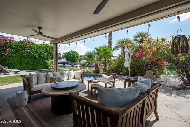 a view of a lake with sitting area