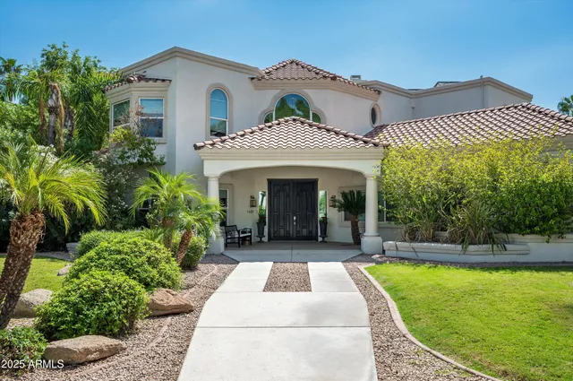 a view of a house with a swimming pool