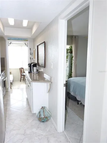 a view of living room and kitchen