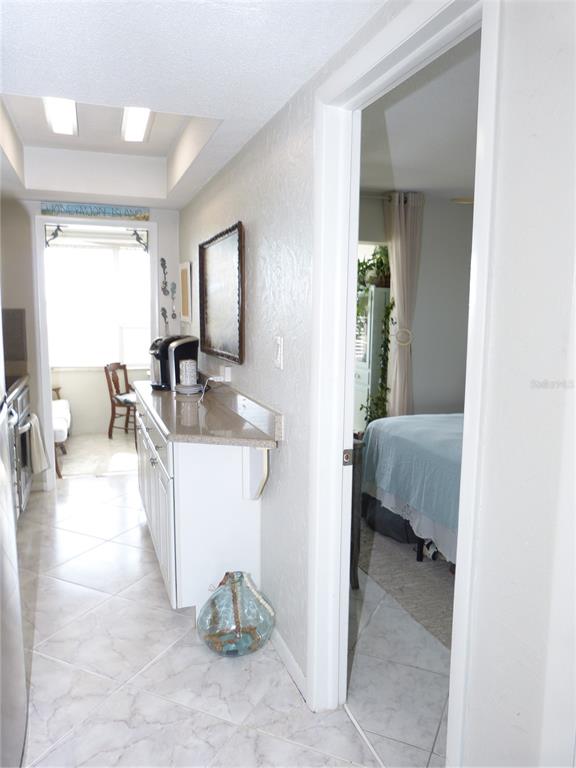 2 Causeway Boulevard, Unit 206 Dunedin, FL 34698 - Photo 12 of 26 a view of living room and kitchen