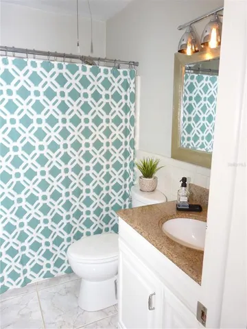 a bathroom with a sink and a toilet