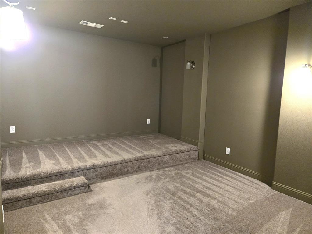 680 Wingate Road Coppell, TX 75019 - Photo 18 of 23 a view of a livingroom with an empty space and a window