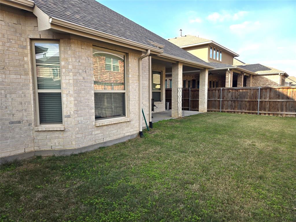 680 Wingate Road Coppell, TX 75019 - Photo 22 of 23 a view of front of a house with a yard