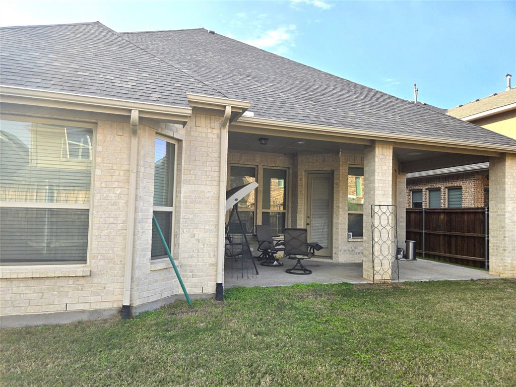 680 Wingate Road Coppell, TX 75019 - Photo 23 of 23 a front view of a house with a yard