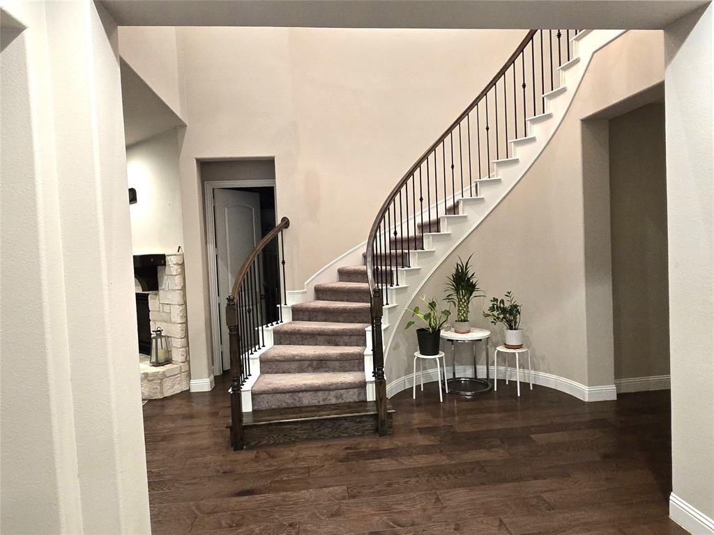 680 Wingate Road Coppell, TX 75019 - Photo 8 of 23 a view of entryway and hall with wooden floor