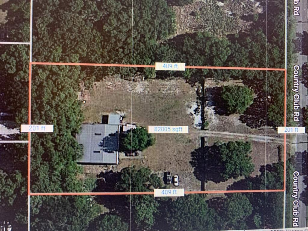 6181 Country Club Road Wesley Chapel, FL 33544 - Photo 1 of 1 Aerial view of lot