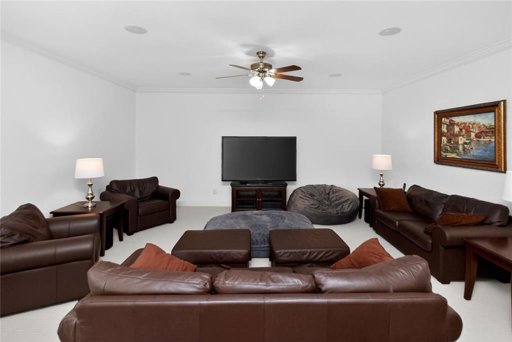 4113 Ledan Extension Gainesville, GA 30506 - Photo 42 of 195 a living room with furniture and a flat screen tv