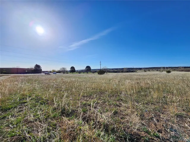 a view of a large body of water and mountain