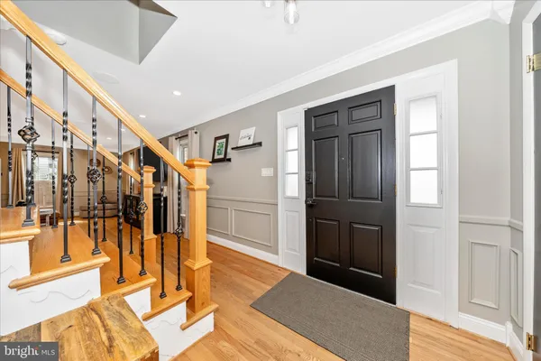a view of entryway with an entryway and livingroom with furniture