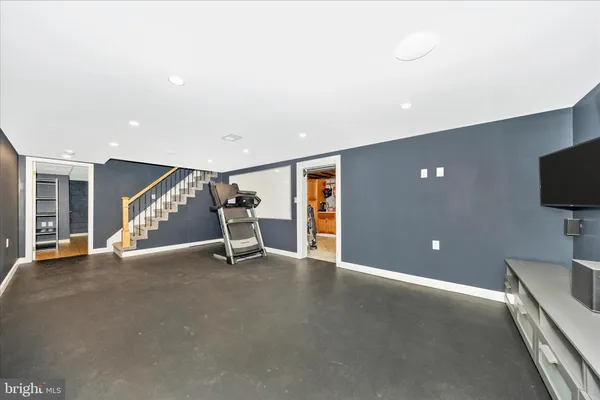 a room with furniture and a window