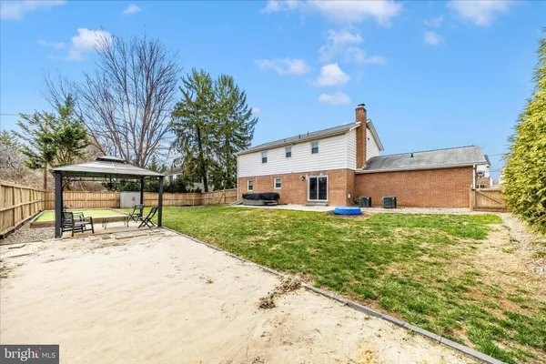 a view of a back yard of the house