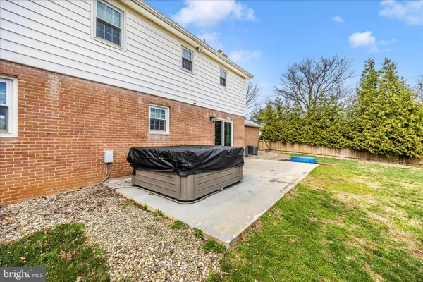 a view of backyard with green space