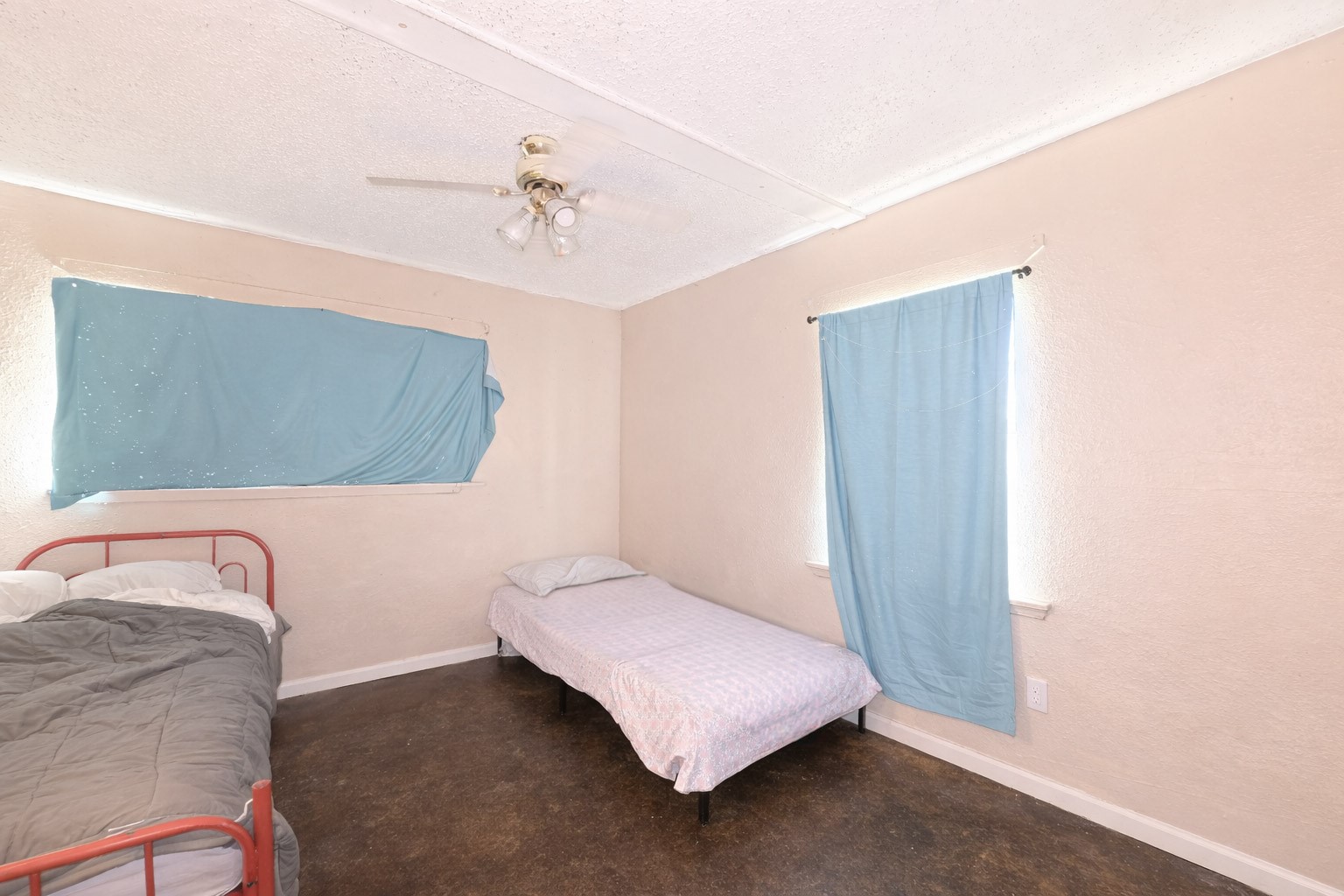 14452 Half Circle Splendora, TX 77372 - Photo 6 of 13 a bedroom with a bed and a chandelier