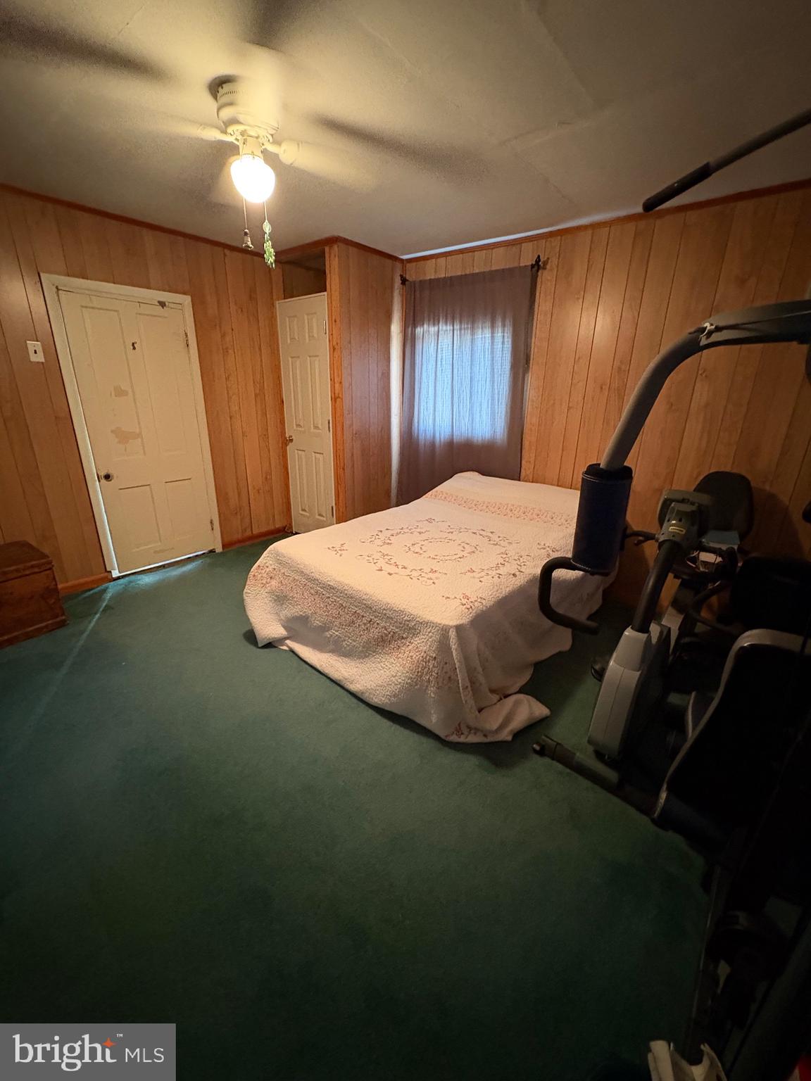 3035 Union Church Road Tylerton, MD 21866 - Photo 17 of 31 a bedroom with a bed and a dresser