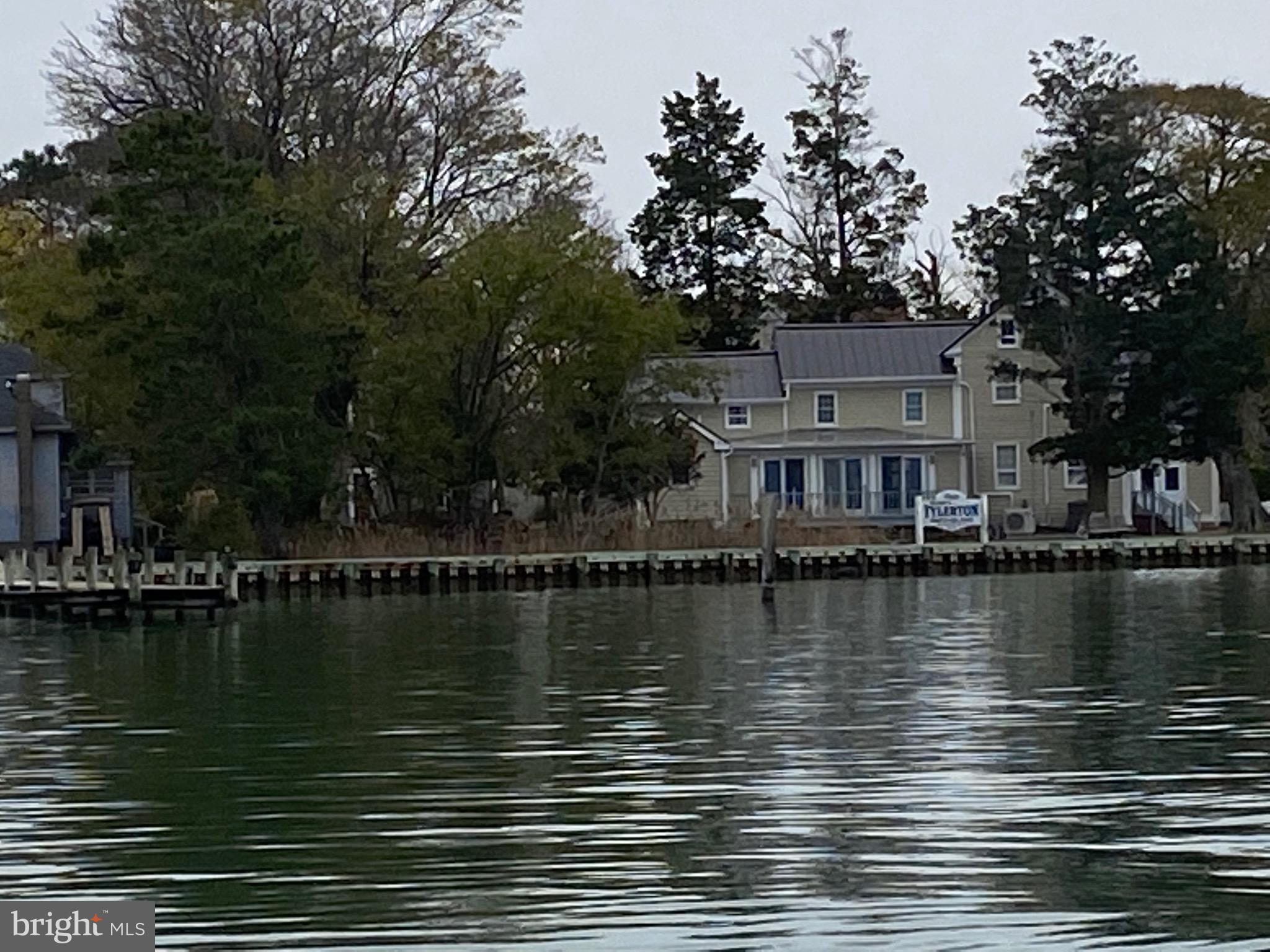 3035 Union Church Road Tylerton, MD 21866 - Photo 19 of 31 a view of a lake with houses