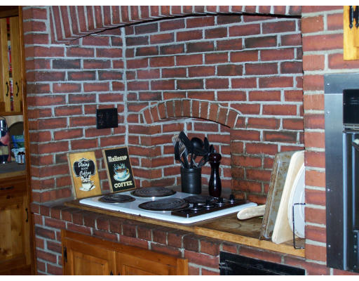 235 Lions Mouth Road Amesbury, MA 01913 - Photo 8 of 12 a bathroom with a sink and a shower