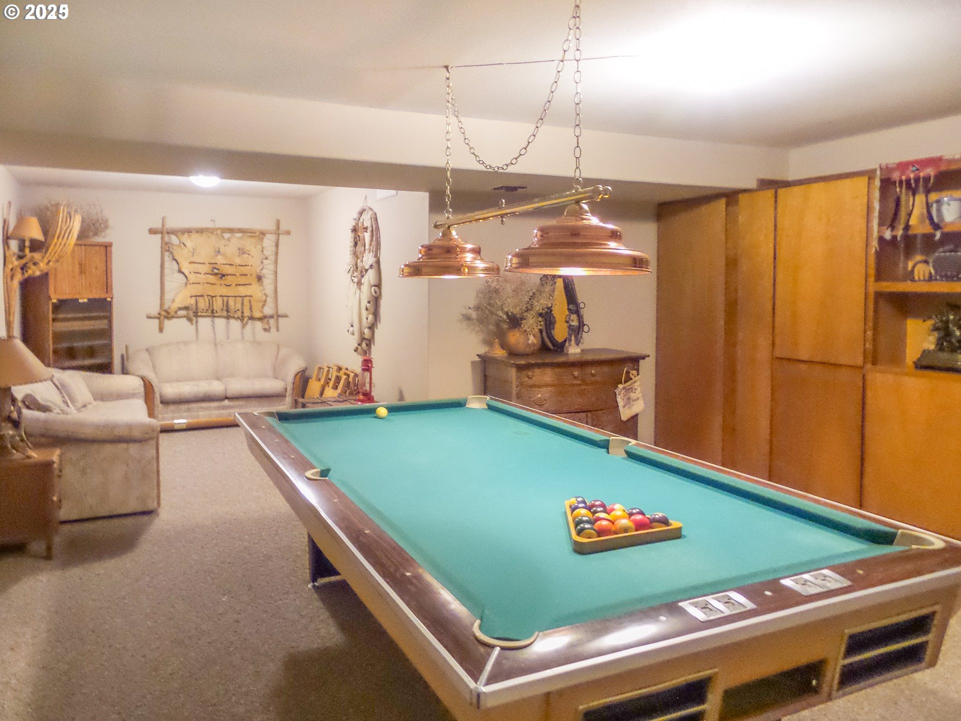 1138 Yokum Road Riddle, OR 97469 - Photo 15 of 33 a room with pool table and a chandelier