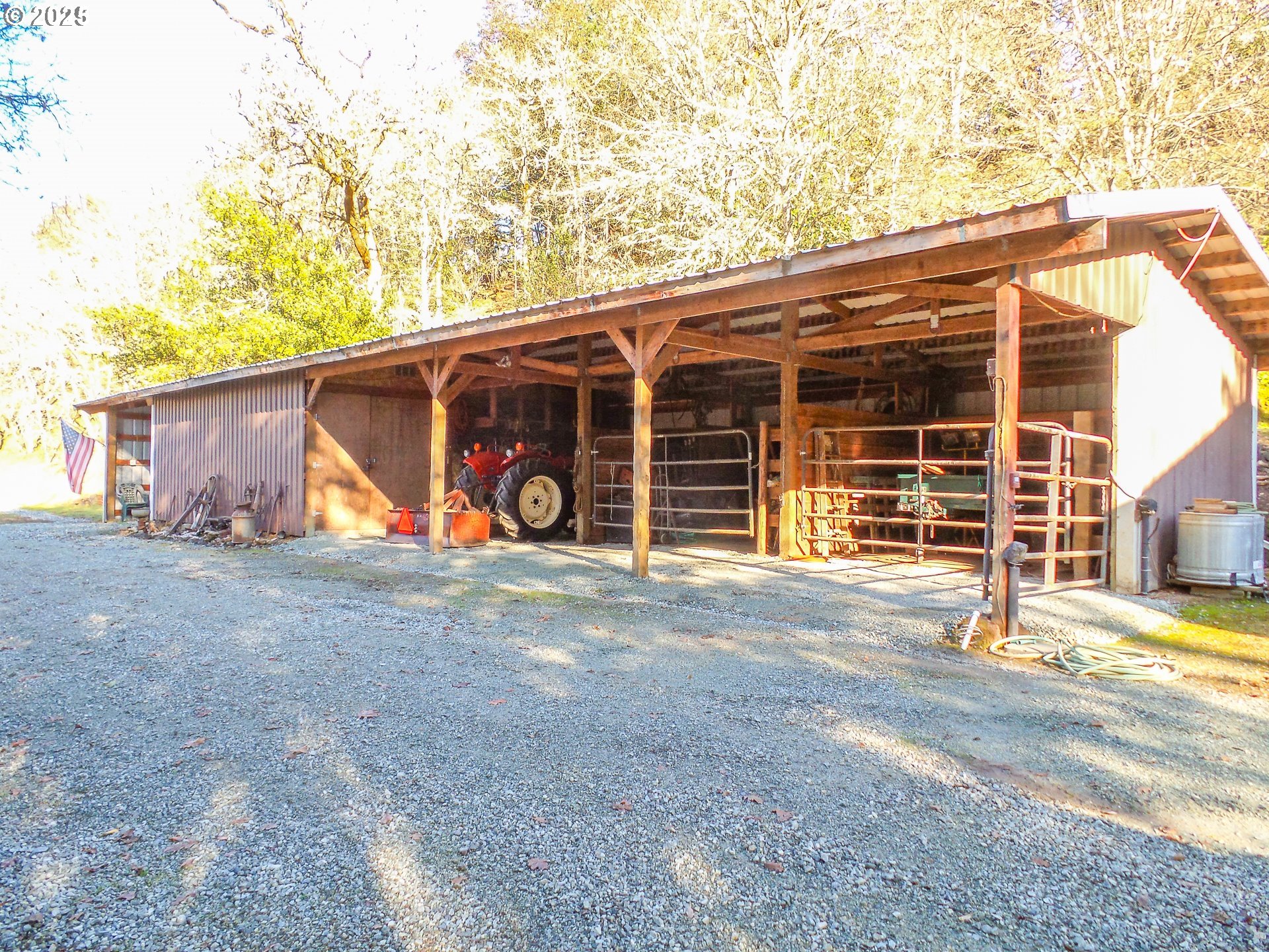 1138 Yokum Road Riddle, OR 97469 - Photo 22 of 33 a view of a house with backyard and garage