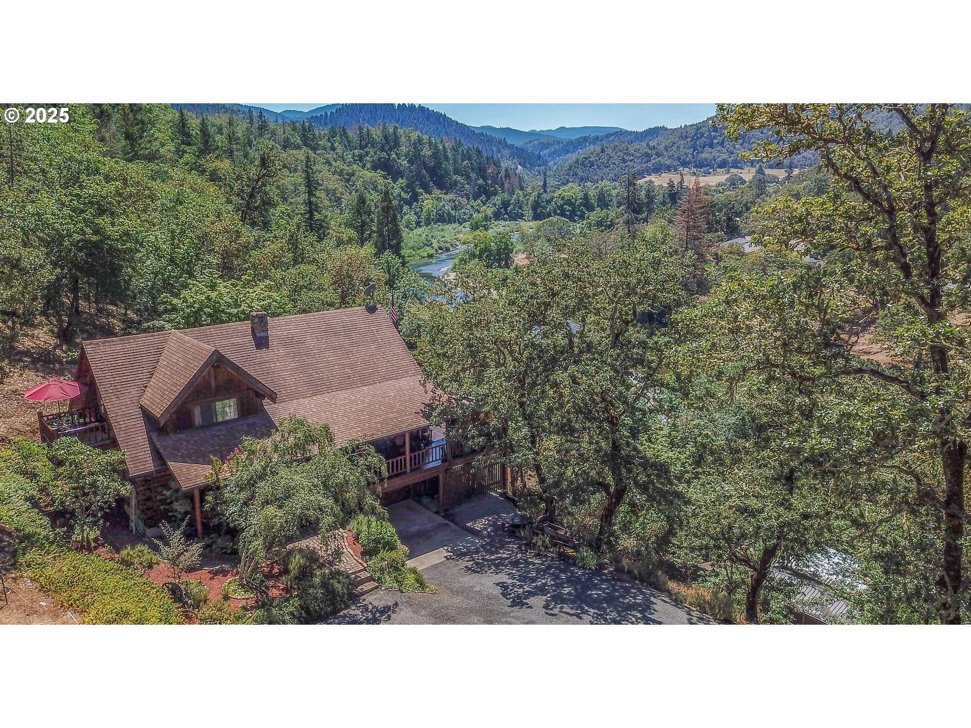 1138 Yokum Road Riddle, OR 97469 - Photo 24 of 33 a black and white photo of a forest