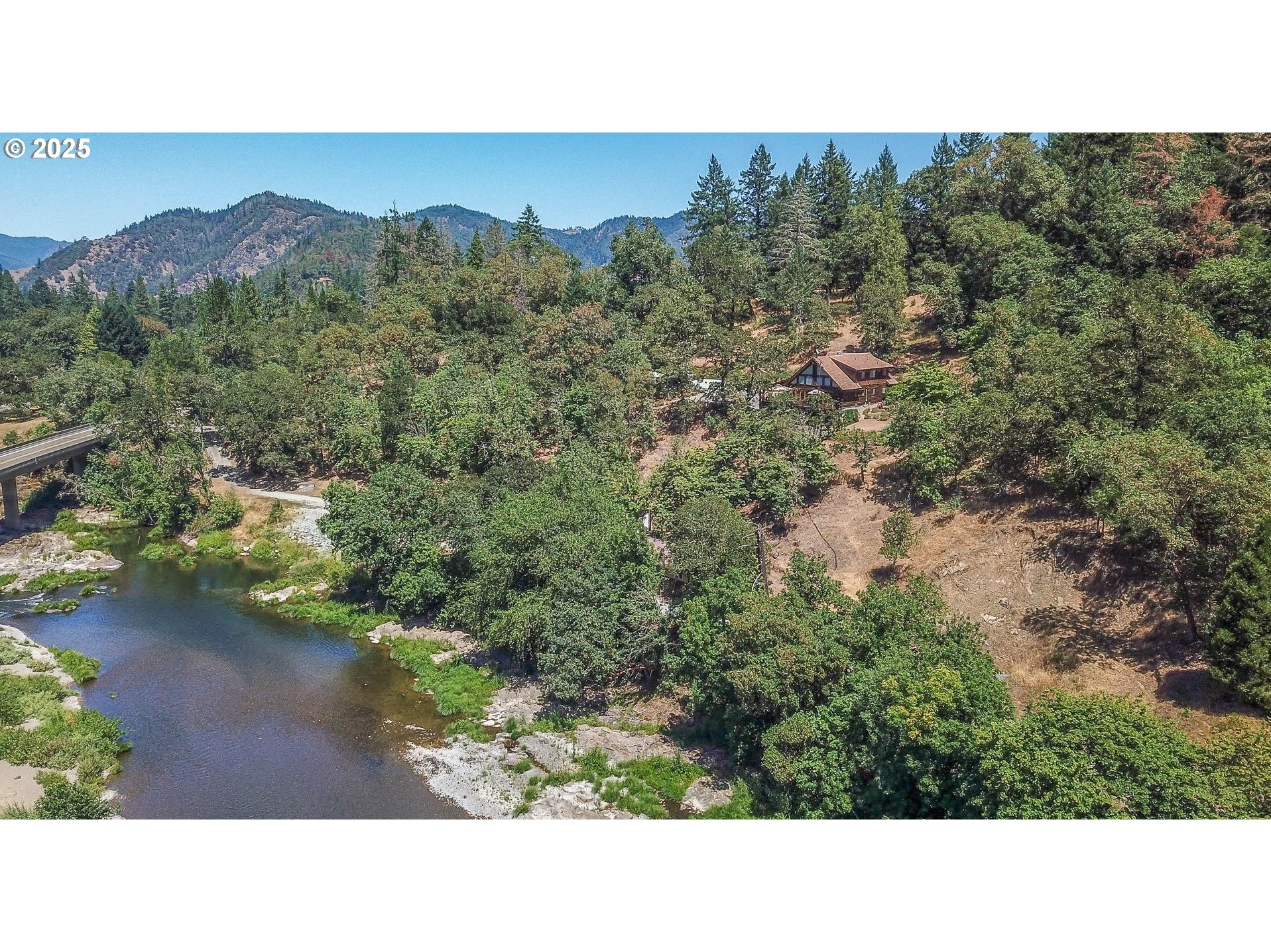 1138 Yokum Road Riddle, OR 97469 - Photo 30 of 33 a black and white photo of a house