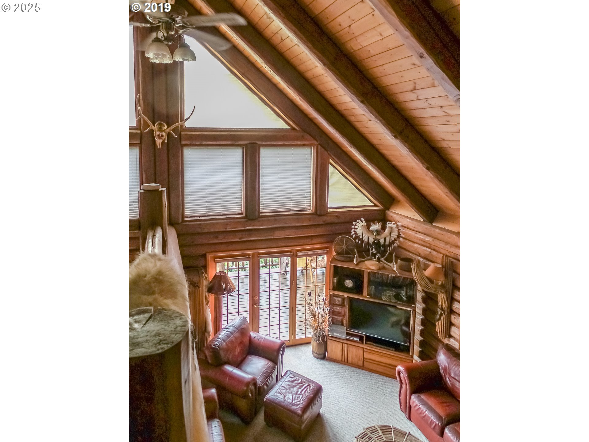 1138 Yokum Road Riddle, OR 97469 - Photo 5 of 33 a living room with furniture and window