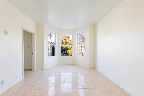 an empty room with windows