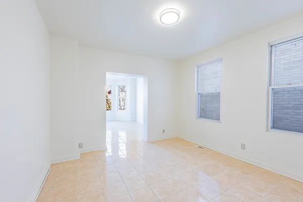 a room with workspace and a window