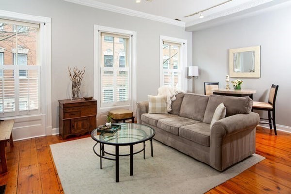 39 Mt Vernon Street, Unit 2 Boston, MA 02129 - Photo 2 of 9 a living room with furniture and a wooden floor