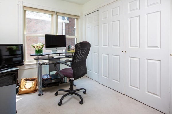 39 Mt Vernon Street, Unit 2 Boston, MA 02129 - Photo 7 of 9 a view of a workspace with furniture and a window