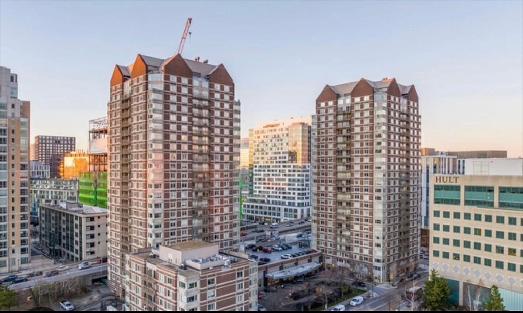 a view of a city with tall buildings