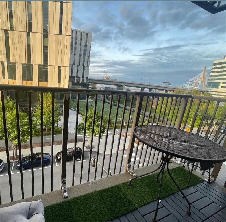 10 Museum Way, Unit 528 Cambridge, MA 02141 - Photo 2 of 10 a view of a balcony with furniture