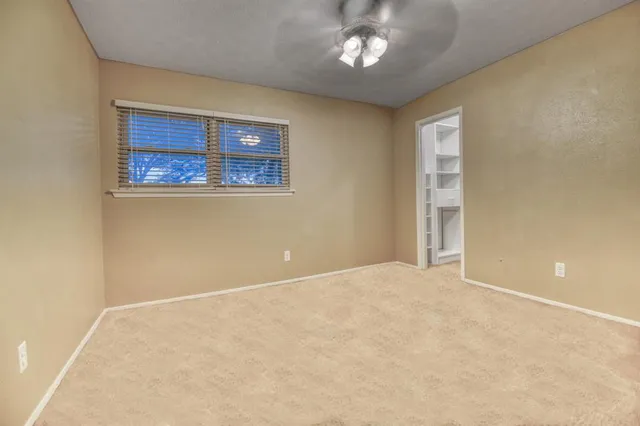 en empty room with a window